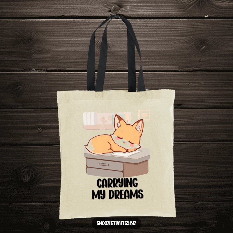 Funny Fox Desk Tote Bag: A sleepy fox character dreams on a desk, ideal for carrying items with a touch of gentle humor.